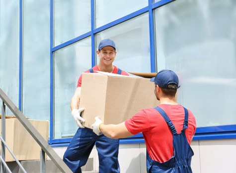 Mover using protective equipment during a relocation job