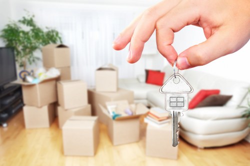 Removal team planning a move in Colliers Wood residential street