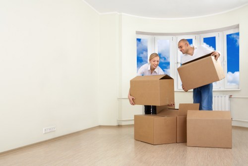 Careful packing and lifting during a flat move in Colliers Wood