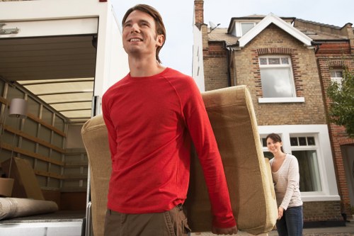Moving van serving a residential property in Colliers Wood
