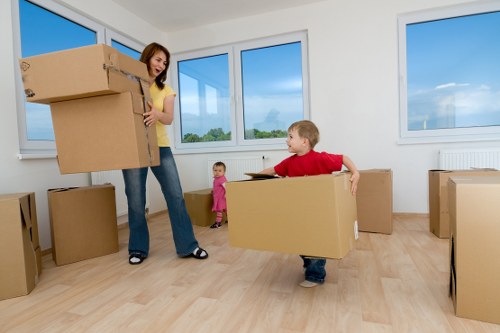 Unloading and placing office furniture at a new workplace in Colliers Wood