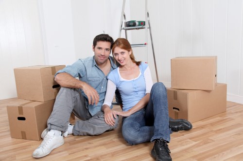 Team preparing boxes and furniture for an office move near Colliers Wood