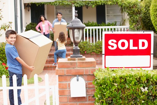 Packed boxes and furniture ready for local removals in Colliers Wood